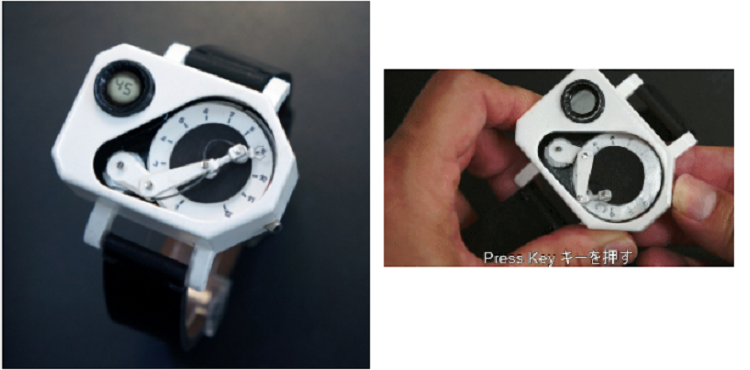 カシャッカシャッ ロボットアームが動いて時間を指す腕時計